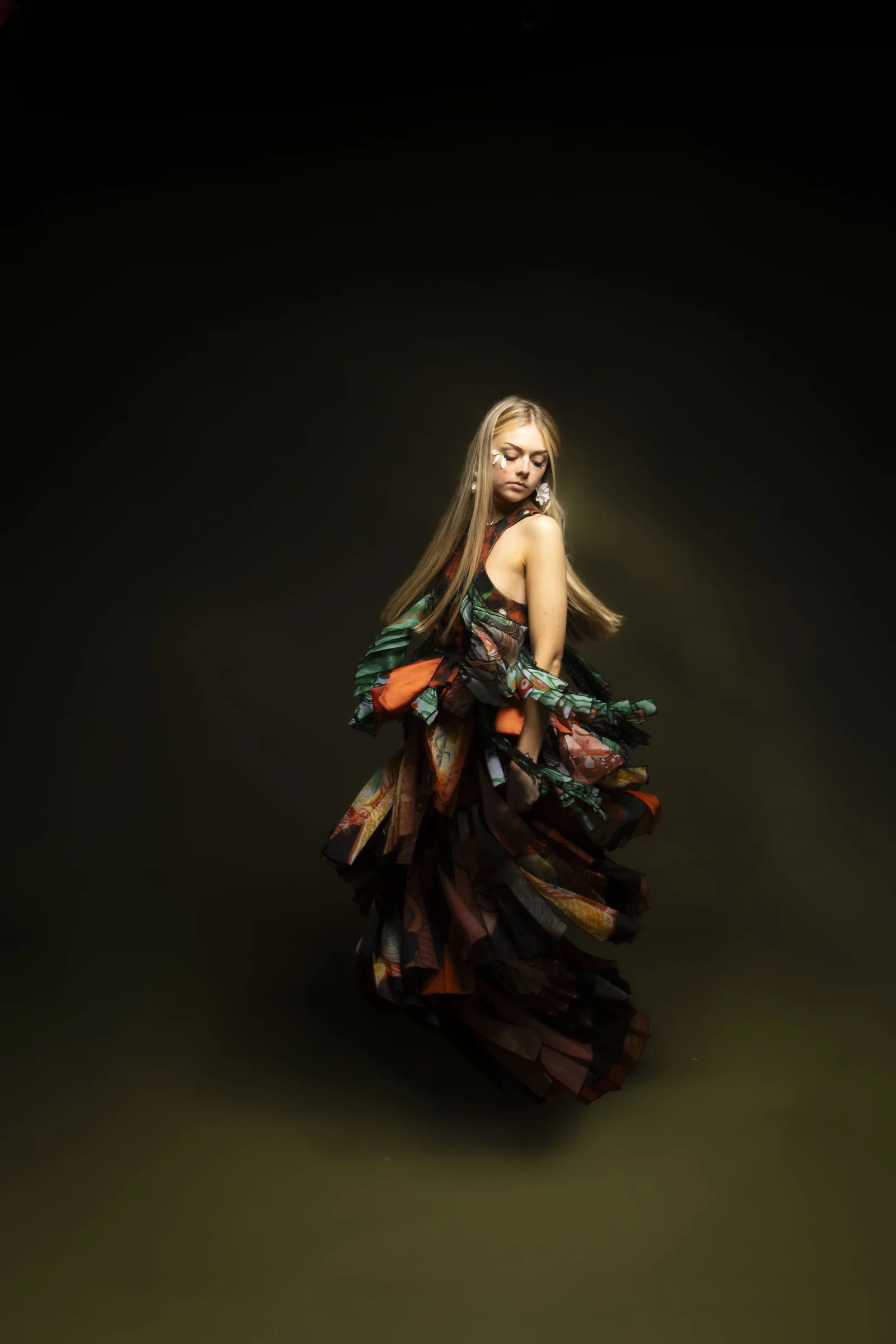 Cover look — ruffled printed gown in studio